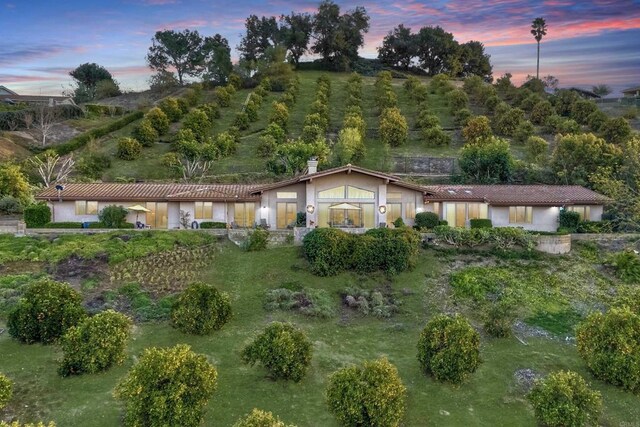 15615 Pauma Valley Dr, Pauma Valley, CA 92061 - ranch-style home featuring a chimney, stucco siding, and a tile roof