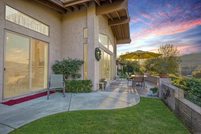 15615 Pauma Valley Dr, Pauma Valley, CA 92061 - patio terrace at dusk with a patio
