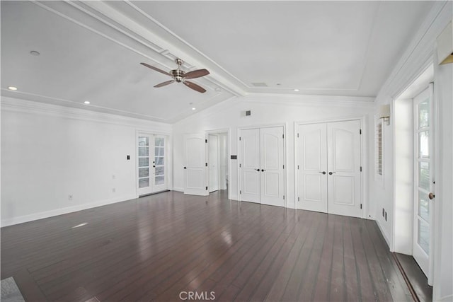 unfurnished living room featuring dark hardwood / wood-style flooring, plenty of natural light, and lofted ceiling with beams