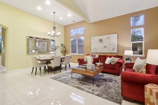 tiled living room featuring a chandelier and beamed ceiling