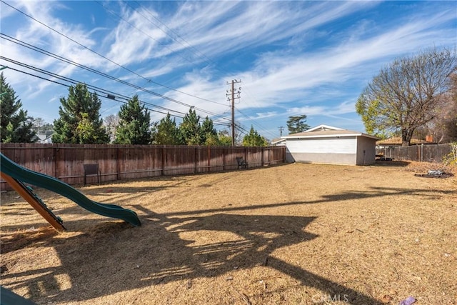 view of yard featuring a playground