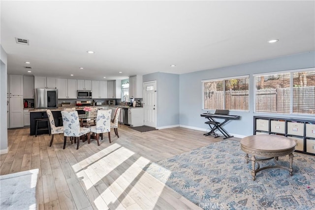 living room with light wood-type flooring