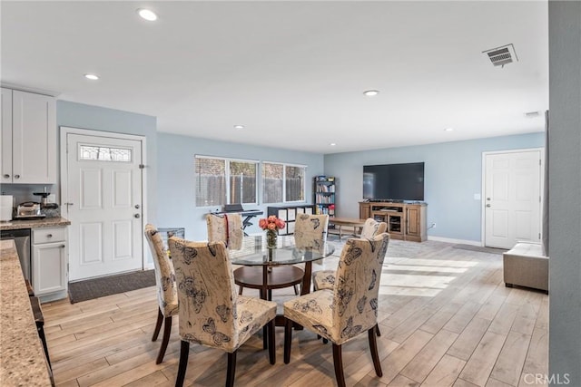 dining area featuring light hardwood / wood-style flooring