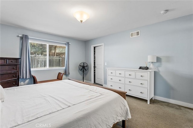 bedroom with light colored carpet