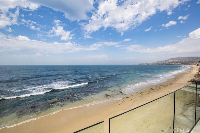 property view of water featuring a view of the beach