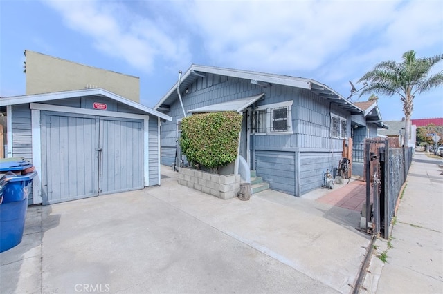 exterior space featuring a storage unit