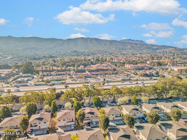 birds eye view of property with a mountain view