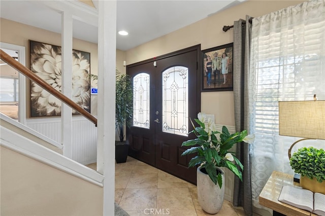 tiled entrance foyer with french doors