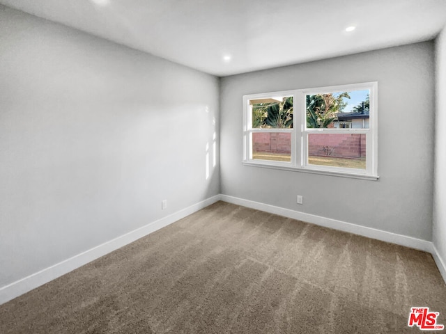 empty room with carpet floors