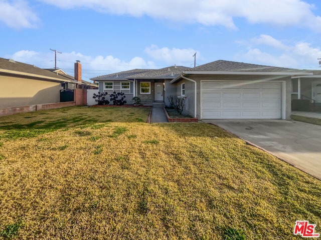 single story home featuring a garage and a front yard