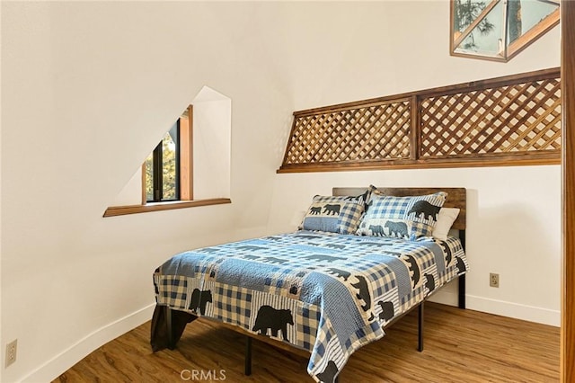 bedroom featuring hardwood / wood-style floors