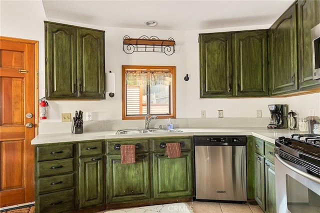 kitchen featuring stainless steel appliances, light tile patterned flooring, and sink