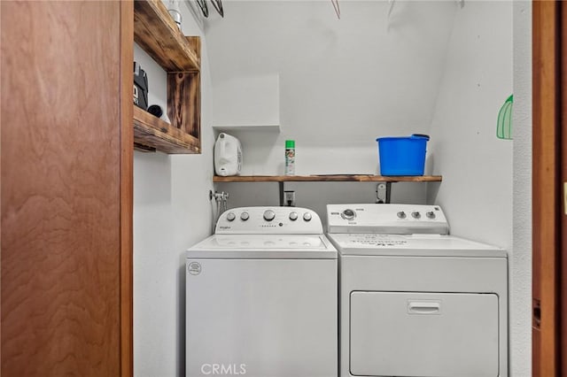 laundry room with independent washer and dryer