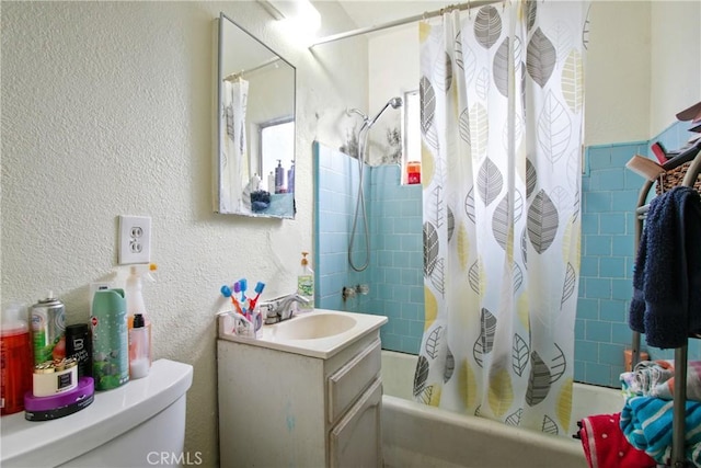 full bathroom featuring vanity, toilet, and shower / bath combo