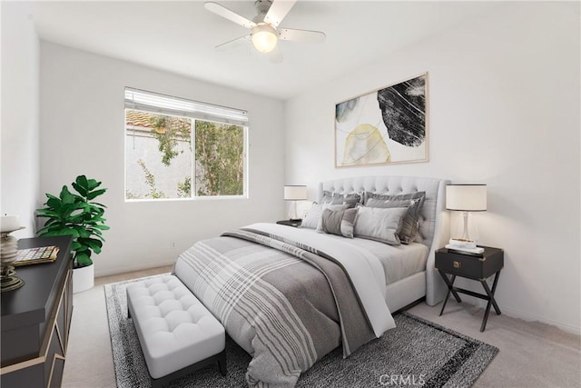 bedroom with ceiling fan and carpet