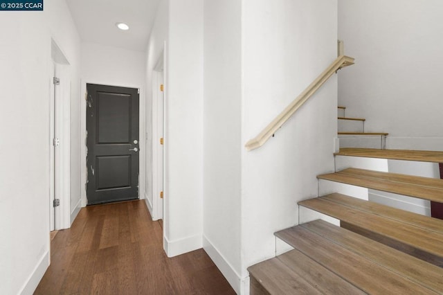 hall featuring dark hardwood / wood-style floors