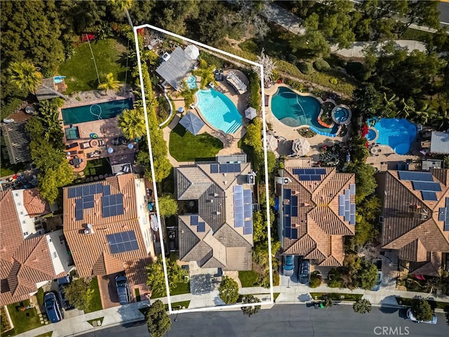 birds eye view of property with a residential view