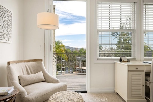 doorway featuring baseboards