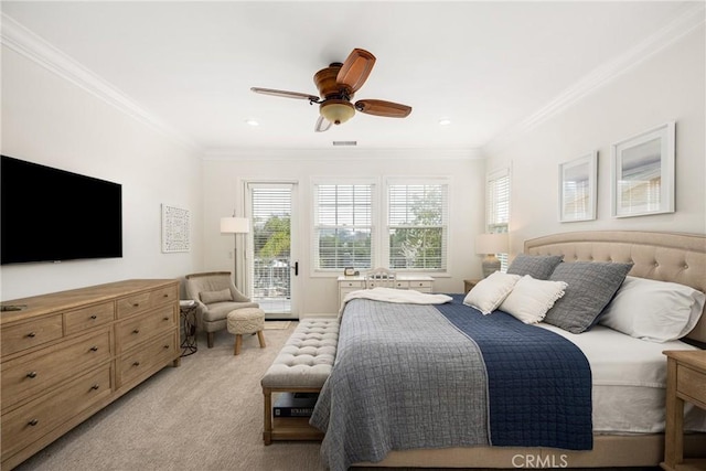 bedroom featuring access to outside, ornamental molding, visible vents, and light colored carpet