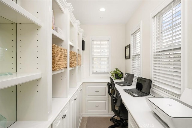 office space featuring recessed lighting