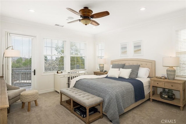 bedroom featuring access to exterior, visible vents, light colored carpet, and crown molding