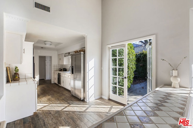 interior space with sink and dark hardwood / wood-style flooring