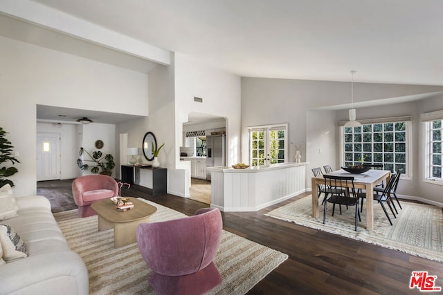 living room featuring high vaulted ceiling and dark hardwood / wood-style floors