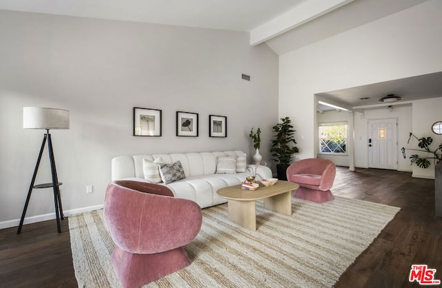 living room with beamed ceiling, dark wood-type flooring, and high vaulted ceiling