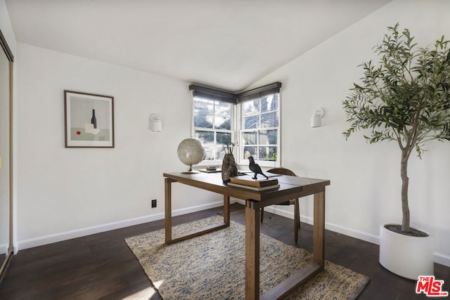 office space featuring dark hardwood / wood-style flooring and vaulted ceiling