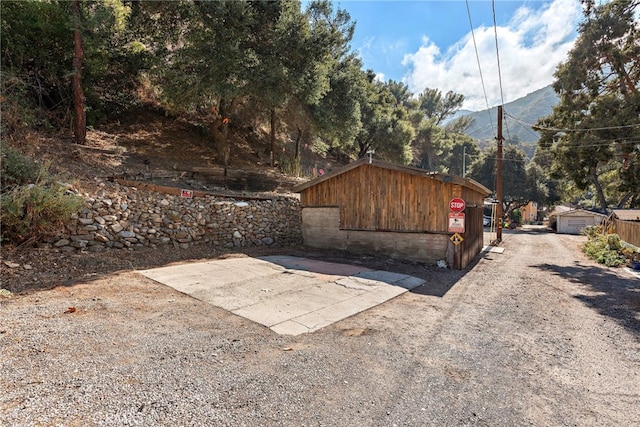 view of outdoor structure featuring a mountain view