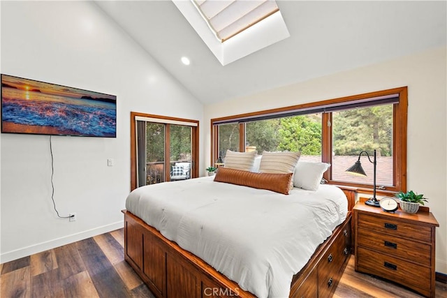 bedroom with dark hardwood / wood-style floors, a skylight, high vaulted ceiling, and access to exterior