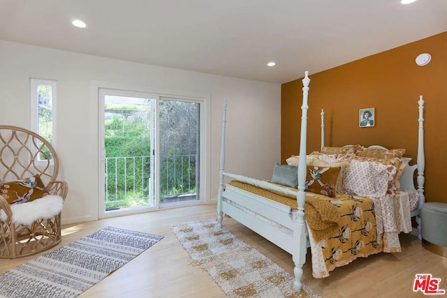 bedroom with wood-type flooring