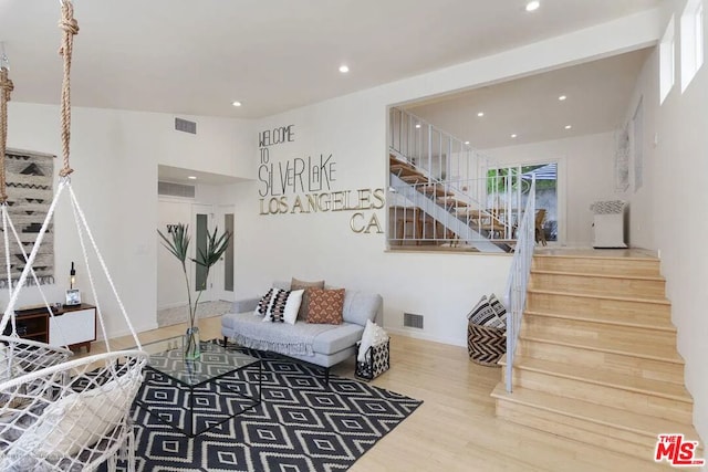 living room with hardwood / wood-style flooring