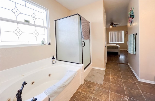 bathroom with ceiling fan and separate shower and tub