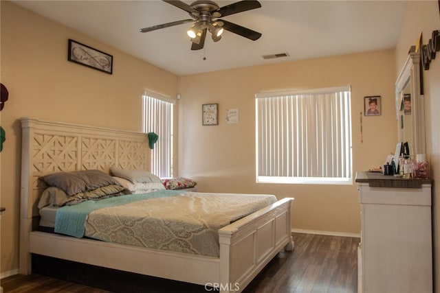 bedroom featuring dark wood-type flooring and ceiling fan