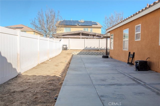 view of yard featuring cooling unit and a patio