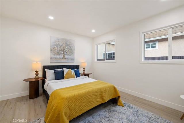 bedroom featuring wood-type flooring