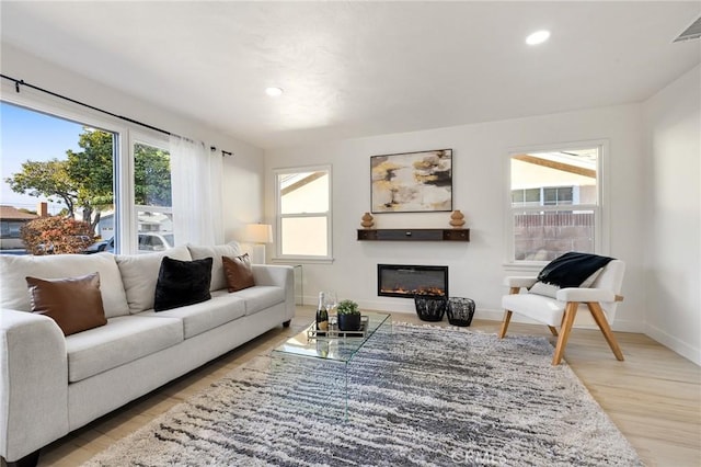 living room with light wood-type flooring