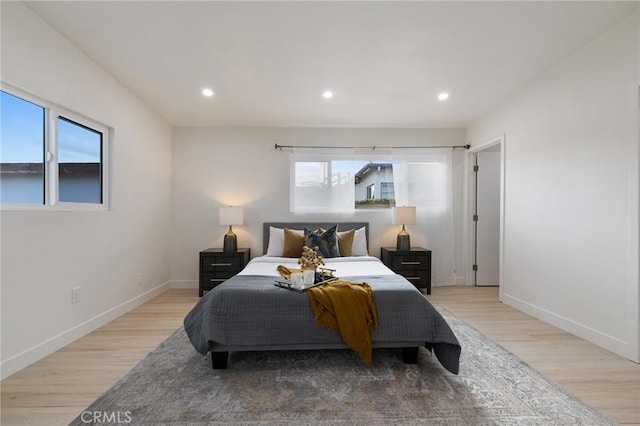 bedroom with light wood-type flooring