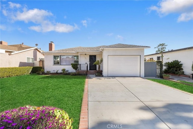 single story home featuring a garage and a front lawn