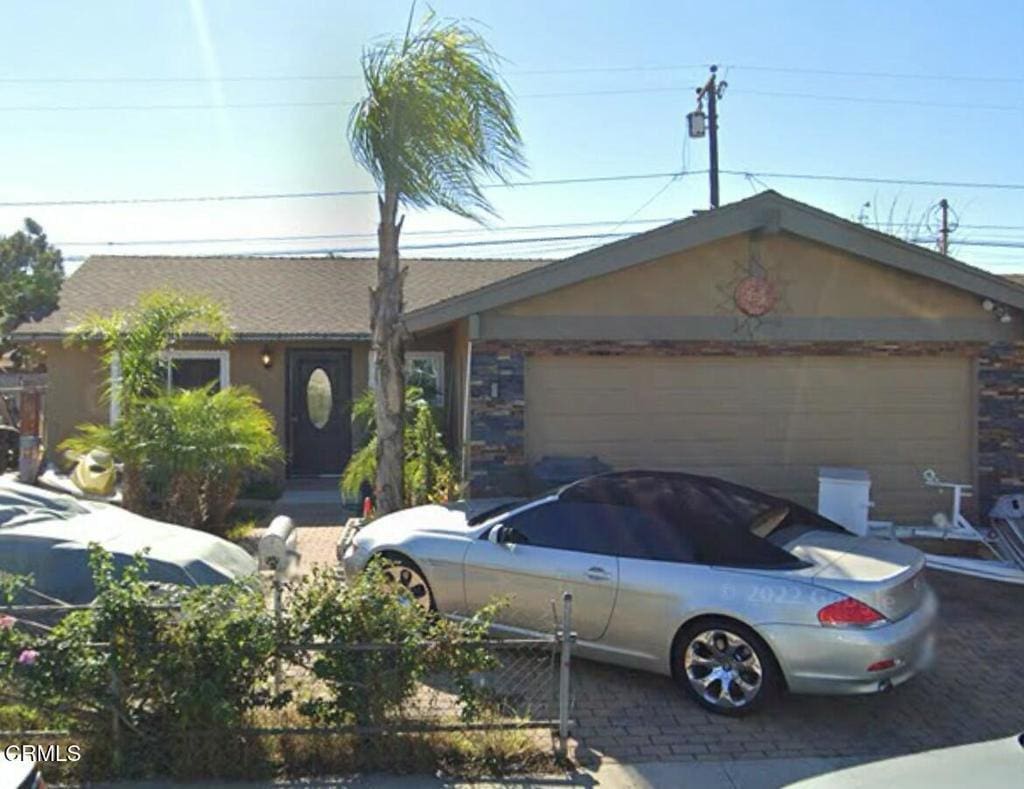 ranch-style home with a garage