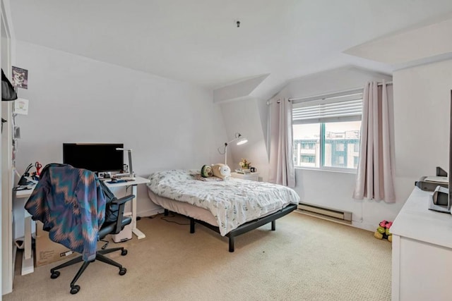 carpeted bedroom featuring a baseboard radiator and vaulted ceiling