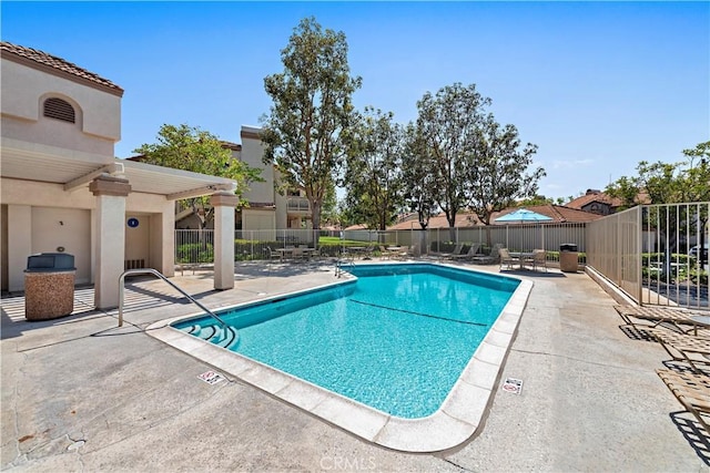 view of pool with a patio area