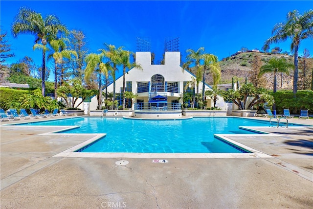 view of pool featuring a patio area