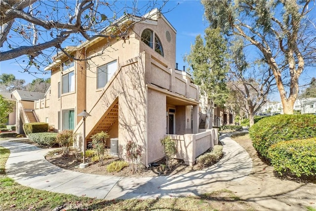 view of home's exterior with central AC