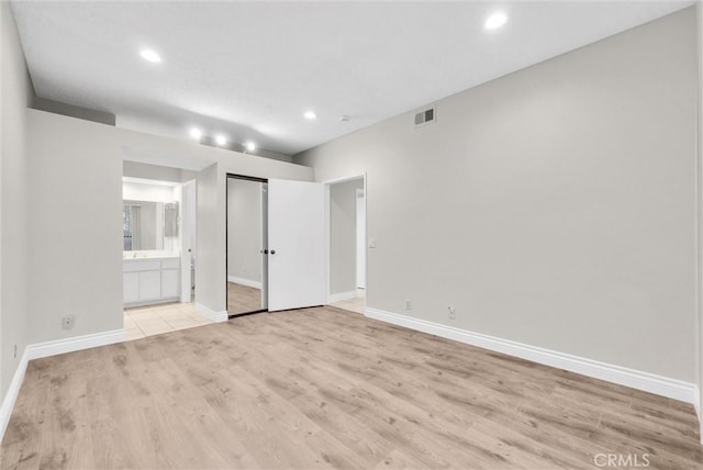 empty room with light wood-type flooring