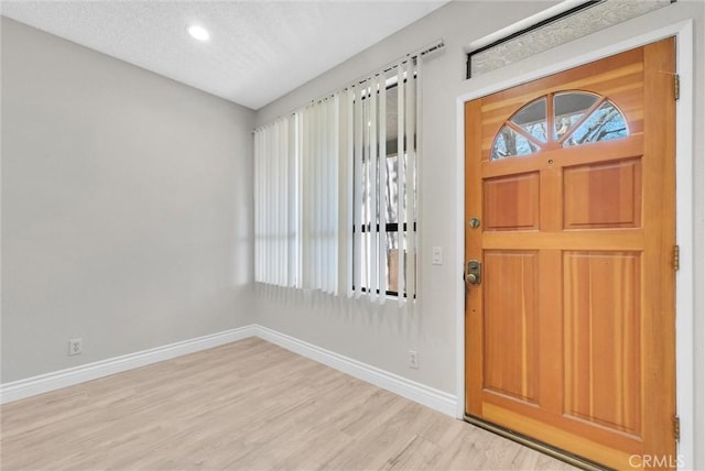 entryway with light wood-type flooring