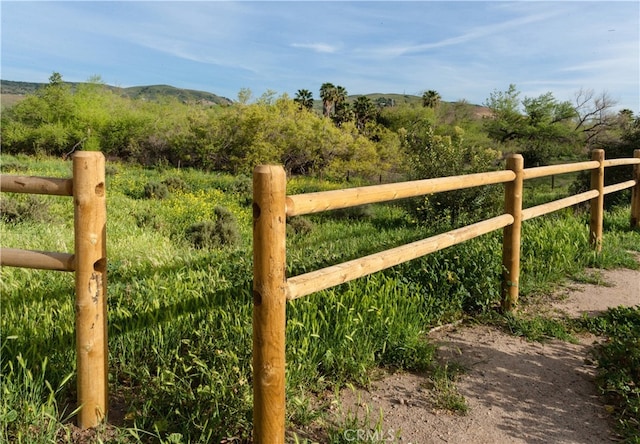 view of gate featuring a rural view