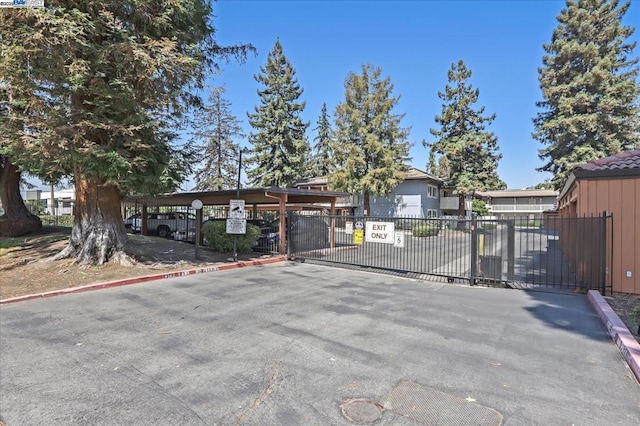 exterior space with a carport