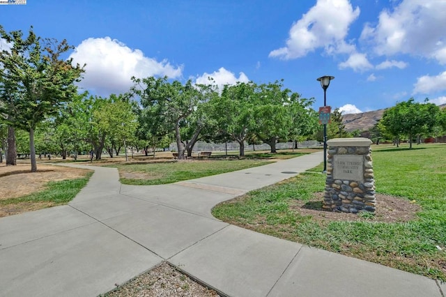 view of community featuring a lawn